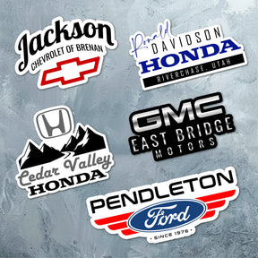 Custom car dealership stickers featuring Honda, GMC, and Ford logos for effective business promotion.